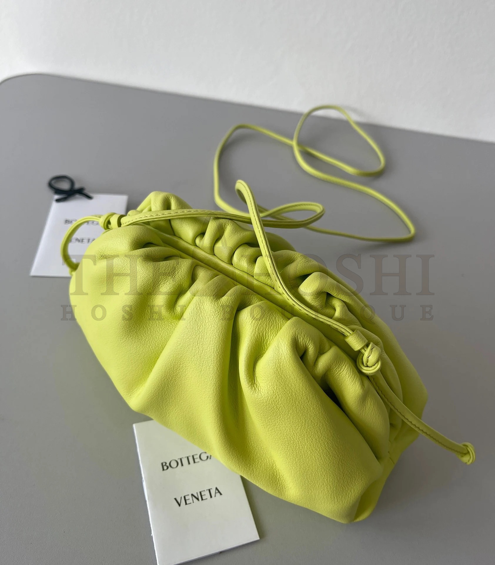 B0tt*ga Ven*ta Mini Pouch with Strap in Kiwi Calfskin Master Quality